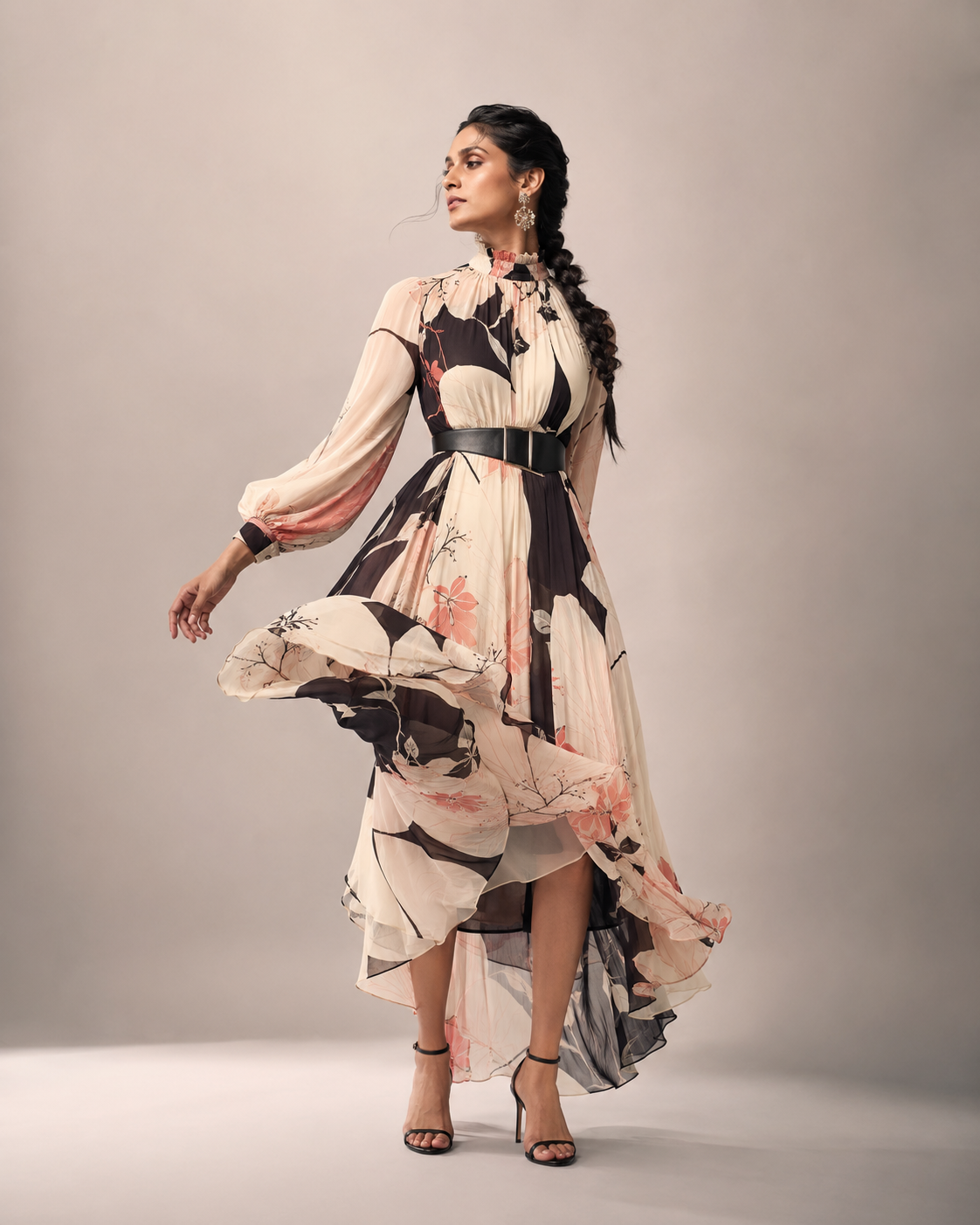 Woman in a fashion-forward flowing botanical dress